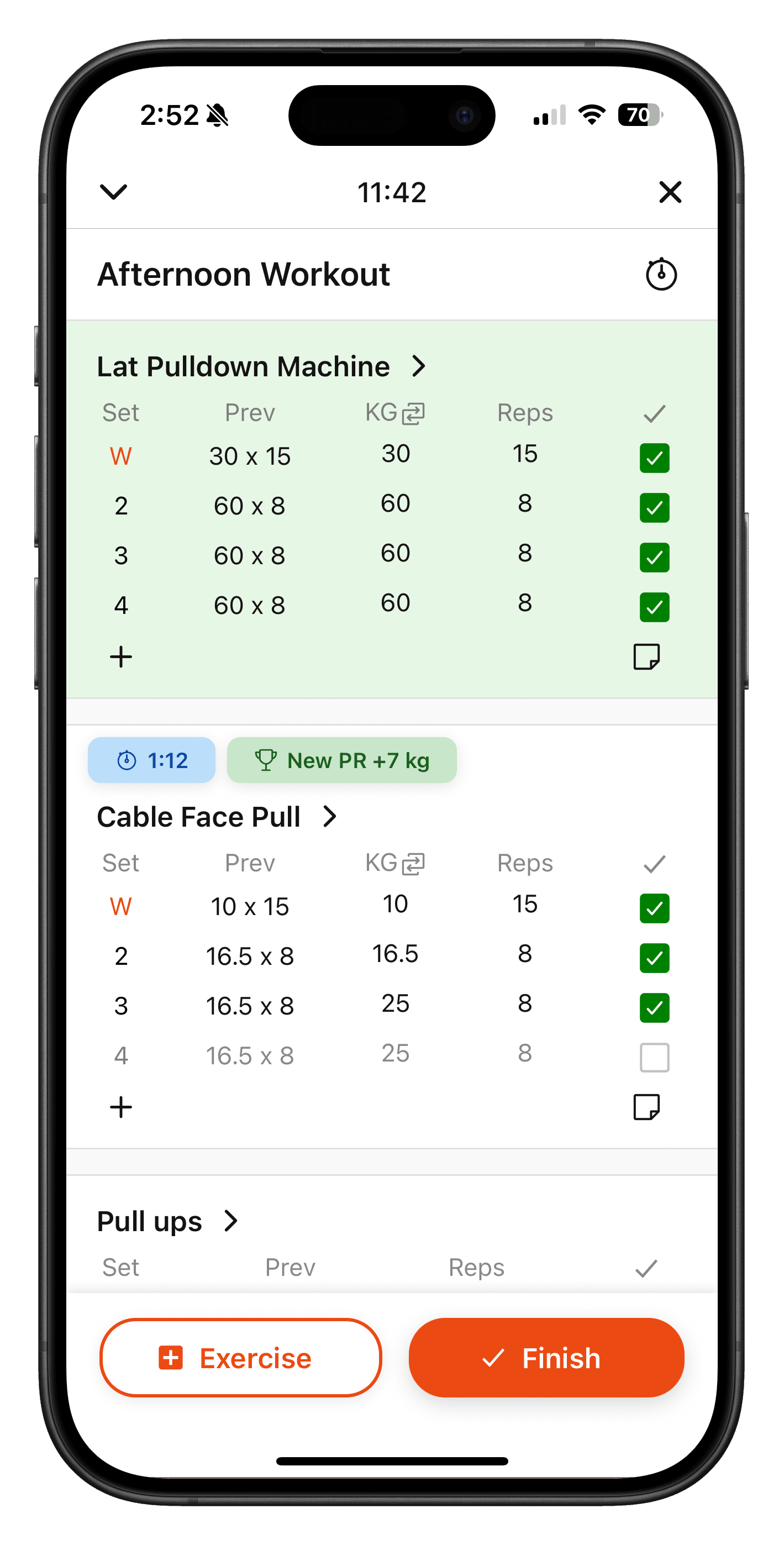 iOS active workout screen showing PR achievements and exercise tracking